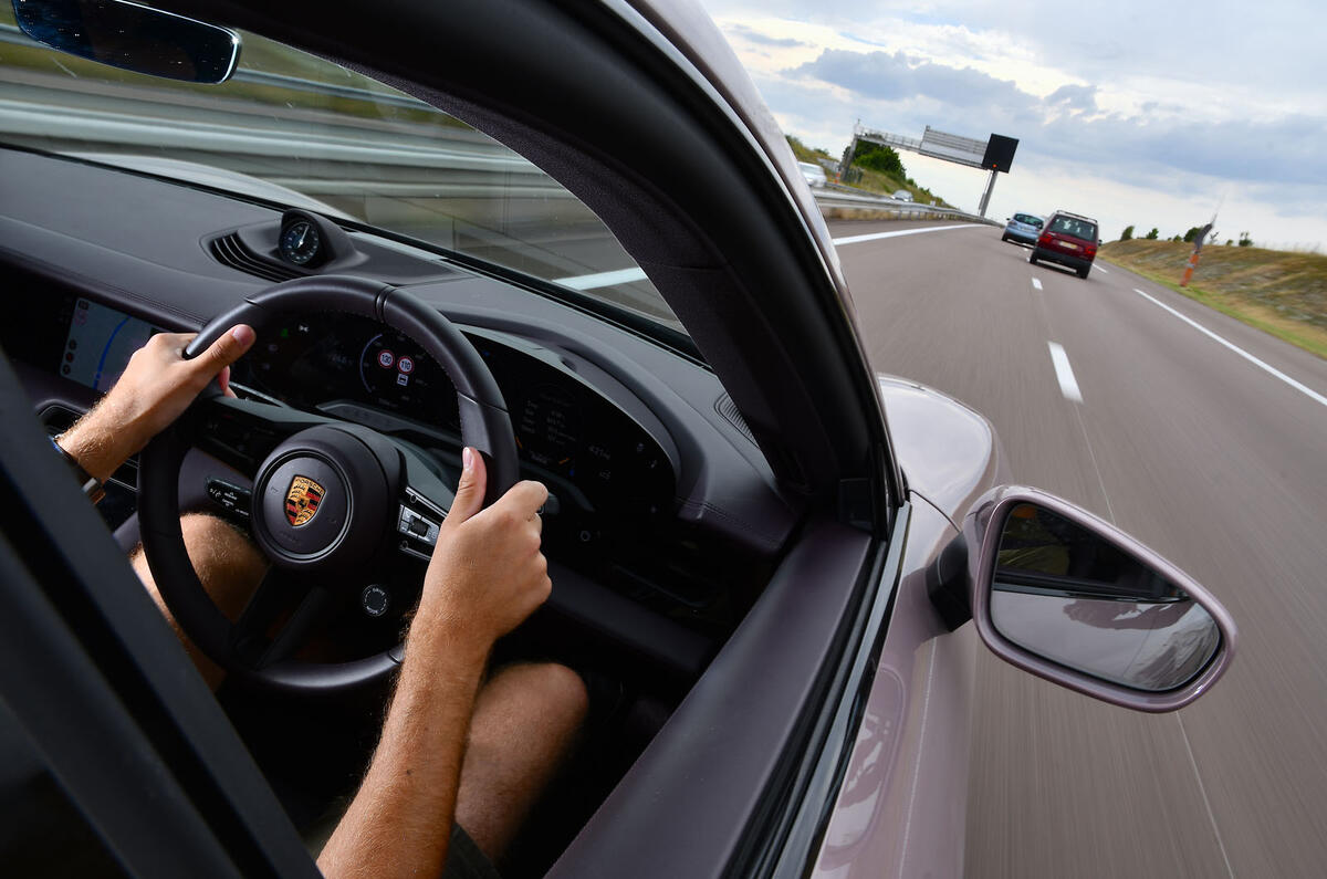 Porsche Taycan driving closeup