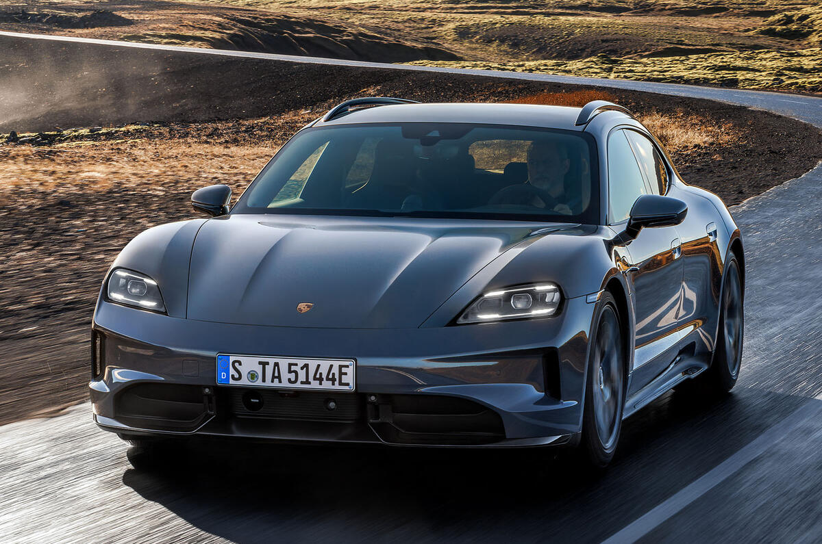 Porsche Taycan GTS Sport Turismo front quarter tracking Porsche Taycan GTS Sport Turismo front quarter tracking