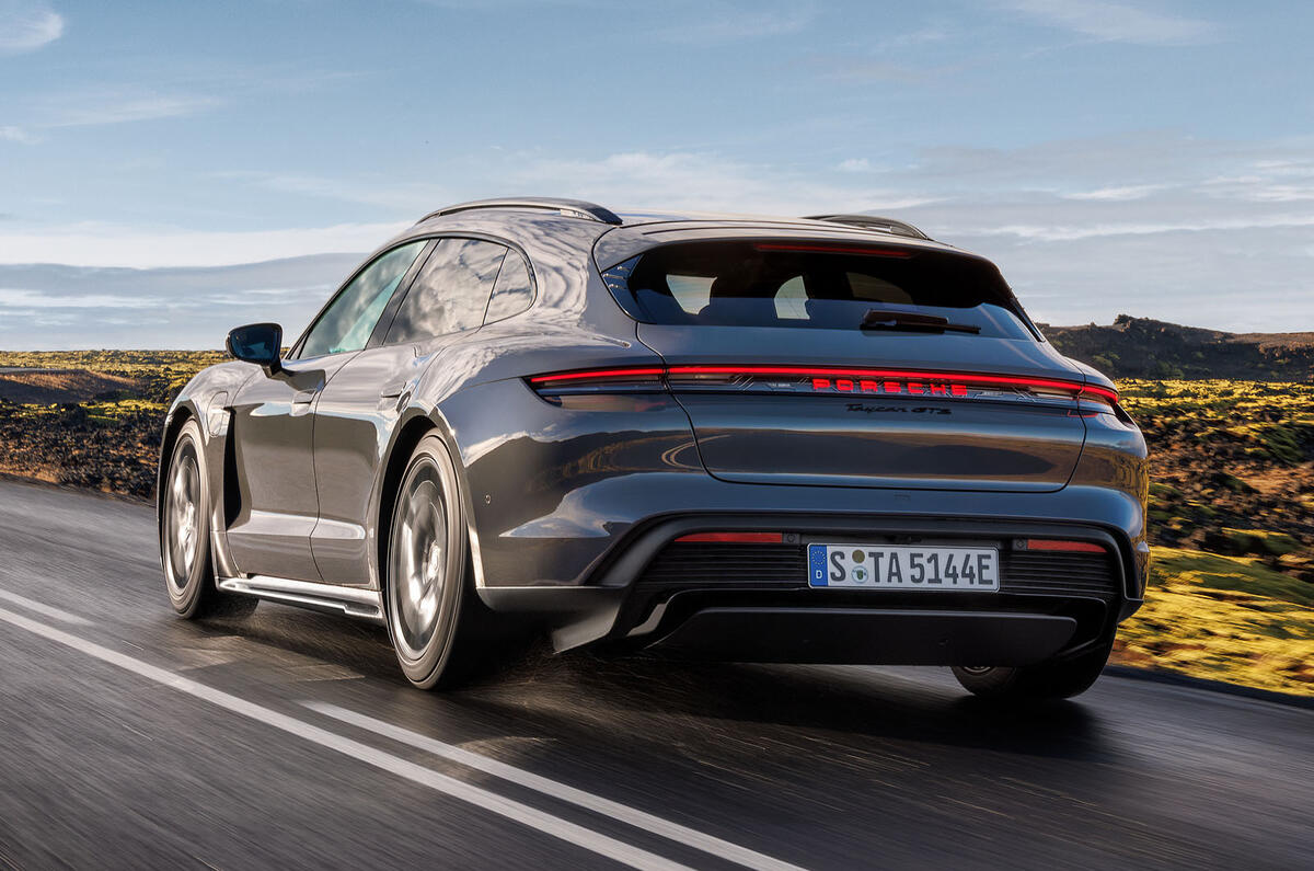 Porsche Taycan GTS Sport Turismo rear quarter tracking Porsche Taycan GTS Sport Turismo rear quarter tracking