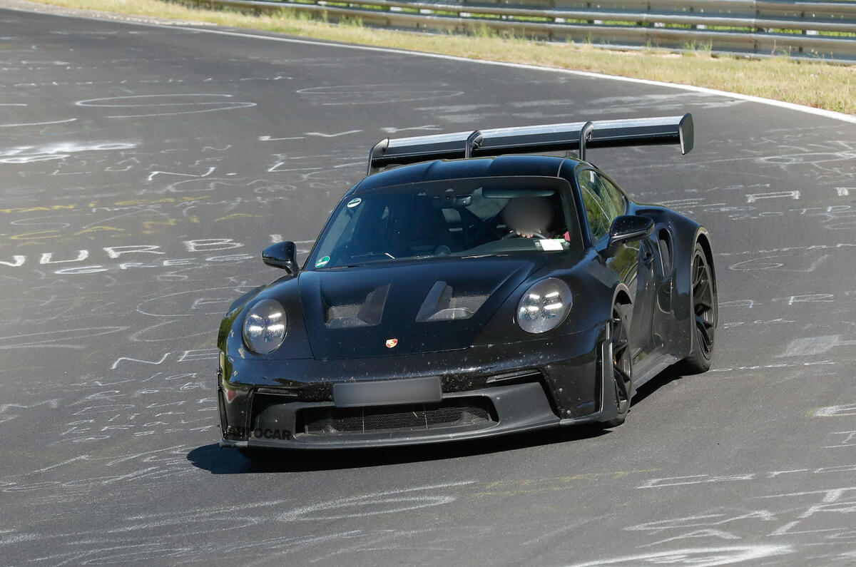 Porsche 911 GT2 RS prototype at the Nurburgring   cornering front three quarters Porsche 911 GT2 RS prototype at the Nurburgring   cornering front three quarters
