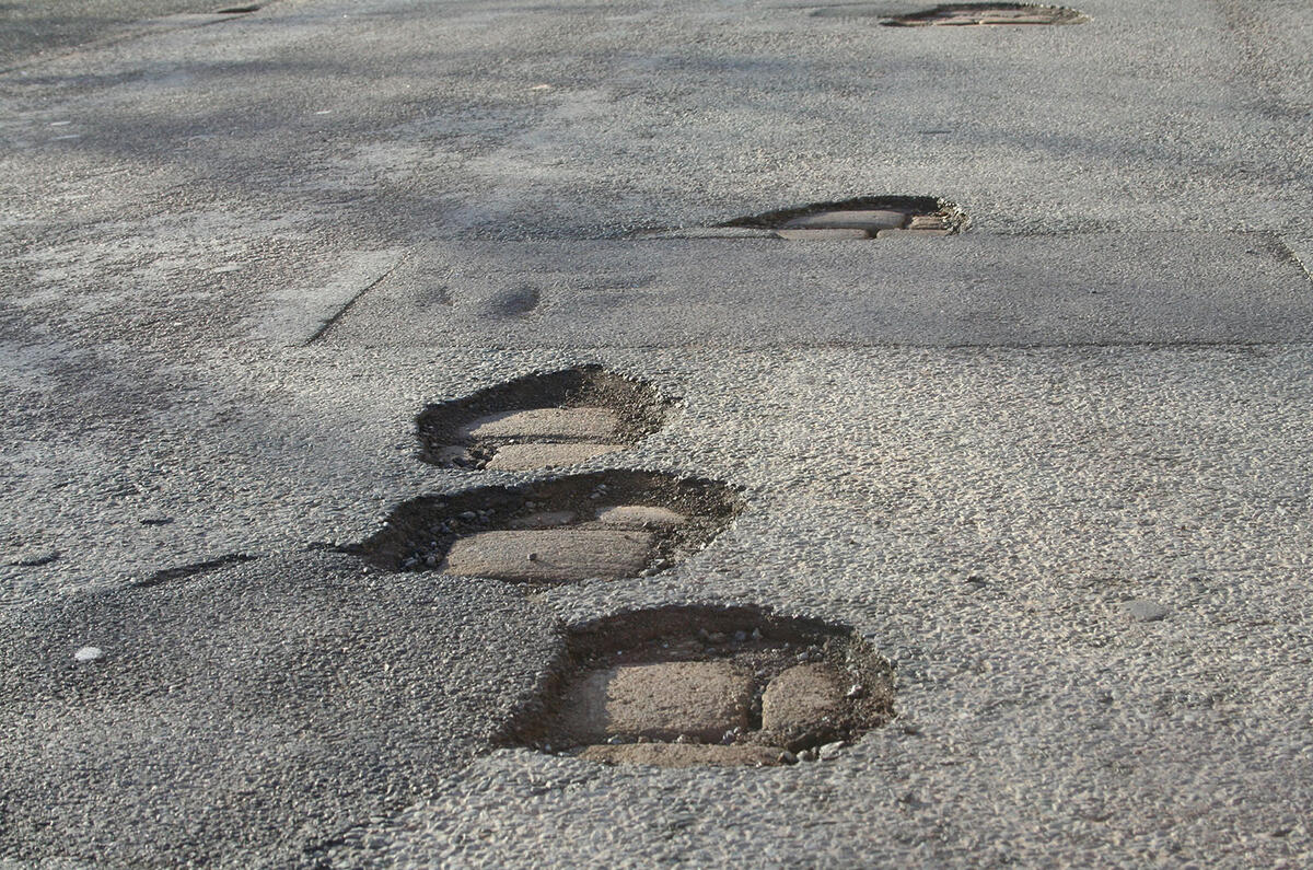 Pothole in road