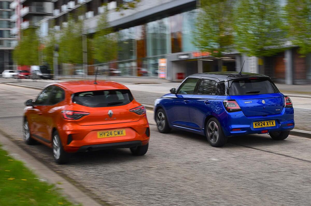 Renault Clio vs Suzuki Swift rear Renault Clio vs Suzuki Swift rear