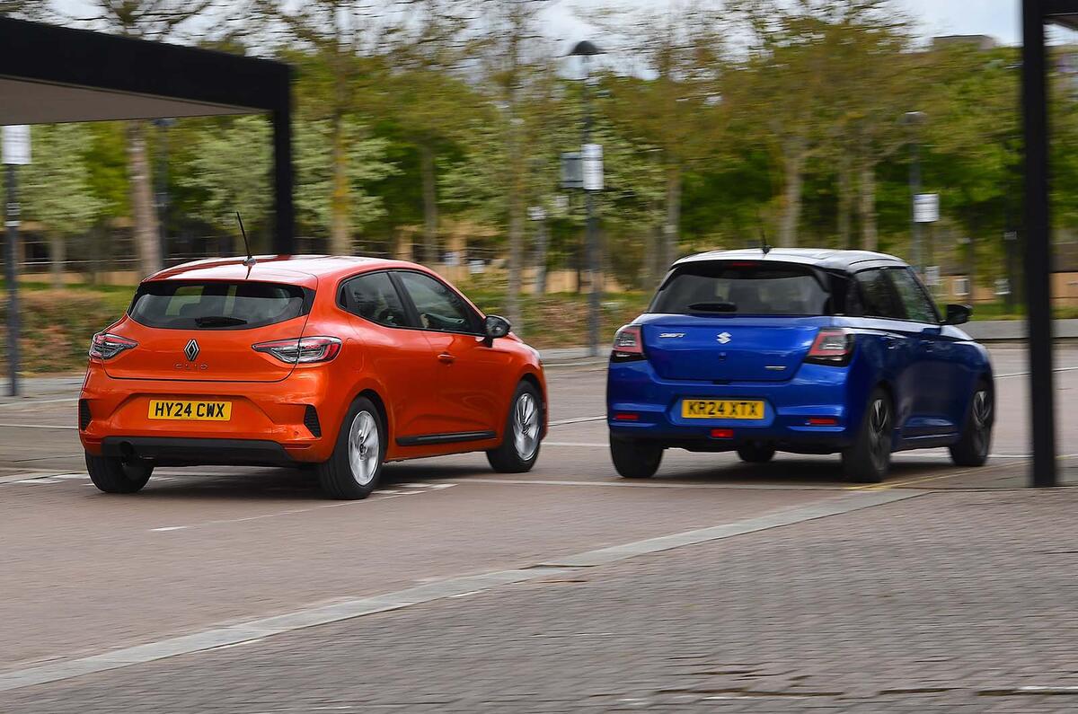 Renault Clio vs Suzuki Swift rear three quarter Renault Clio vs Suzuki Swift rear three quarter