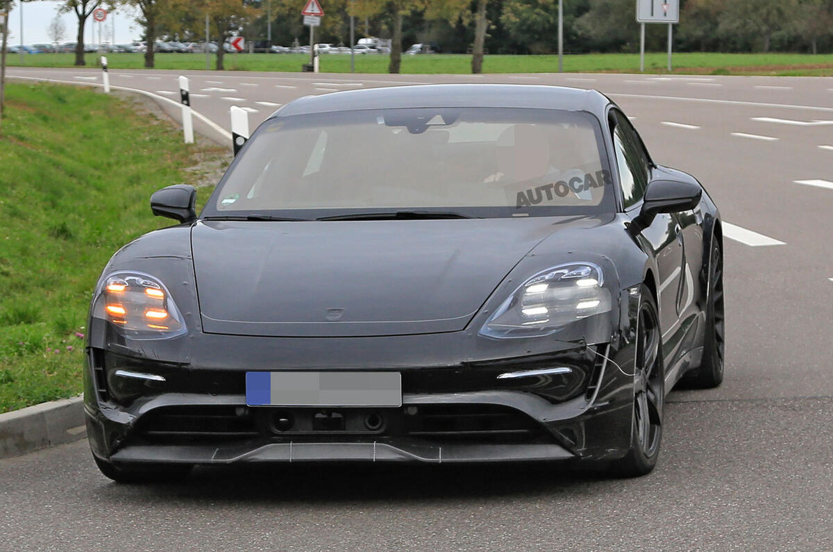 Porsche Taycan seen with production body for first time