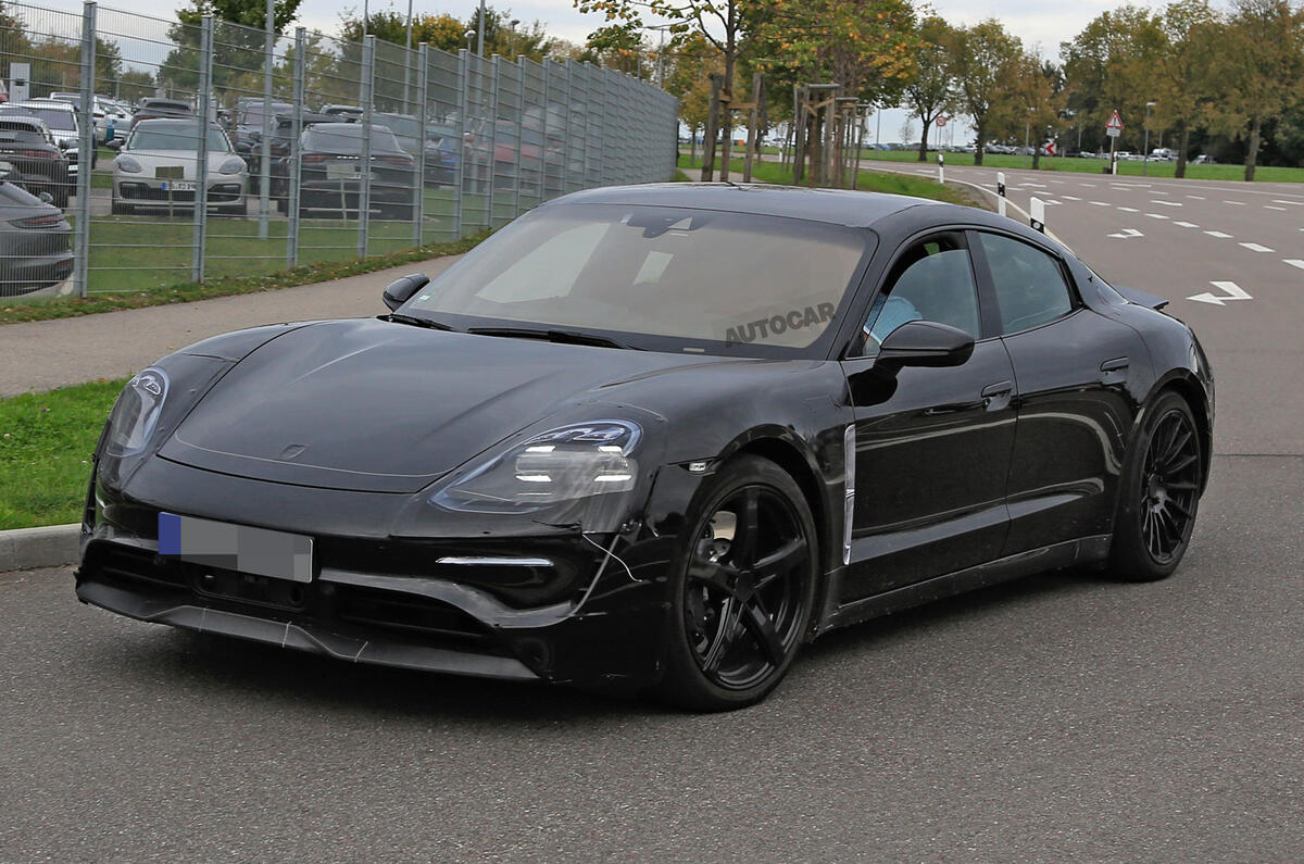 Porsche Taycan seen with production body for first time