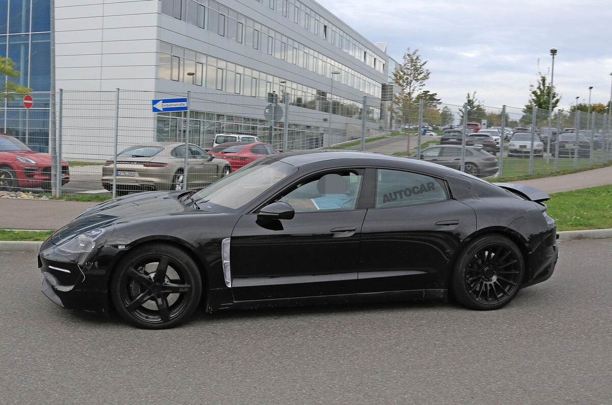 Porsche Taycan seen with production body for first time