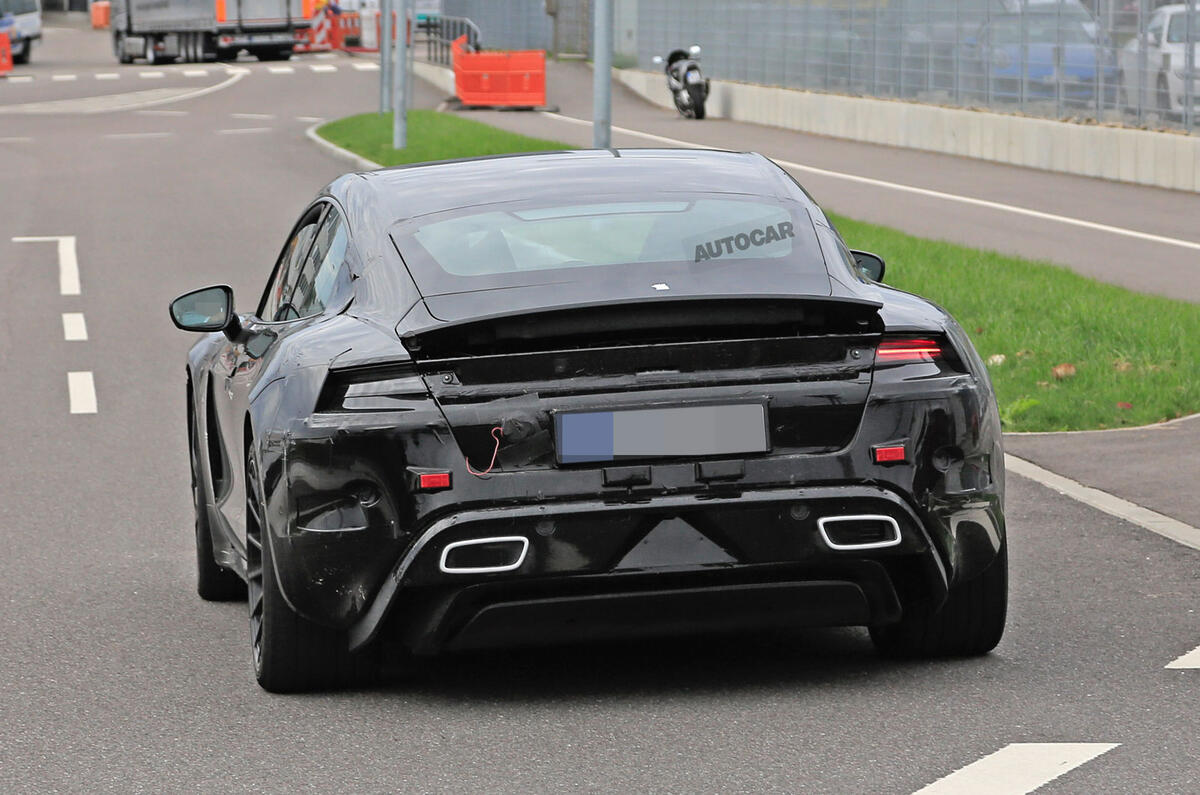 Porsche Taycan seen with production body for first time