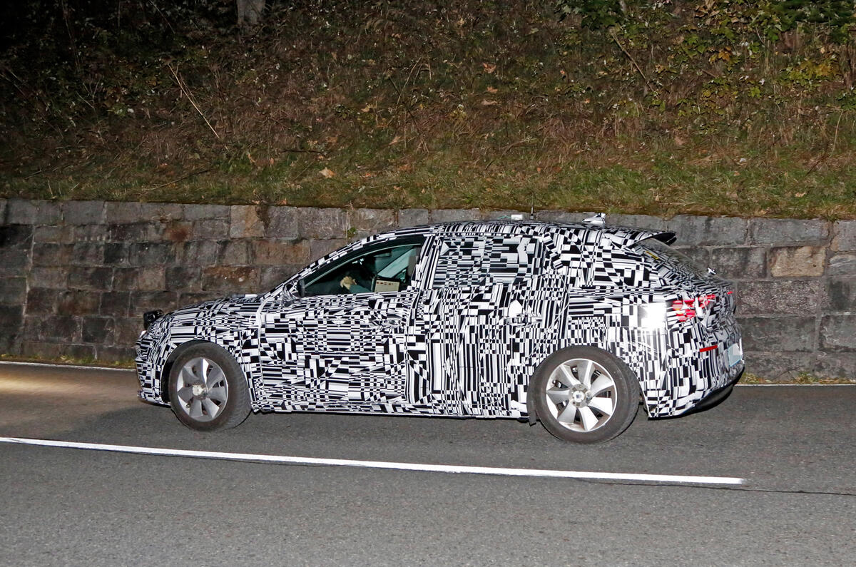 The new Seat Leon being tested under a camouflage wrap