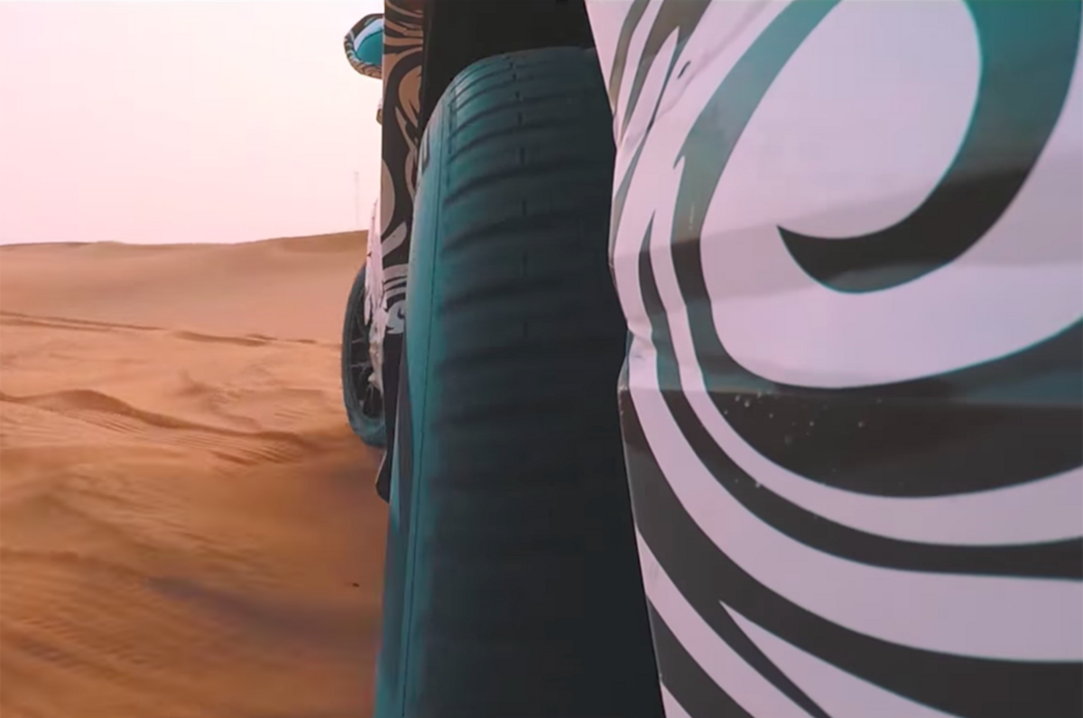 Lamborghini Urus on sand