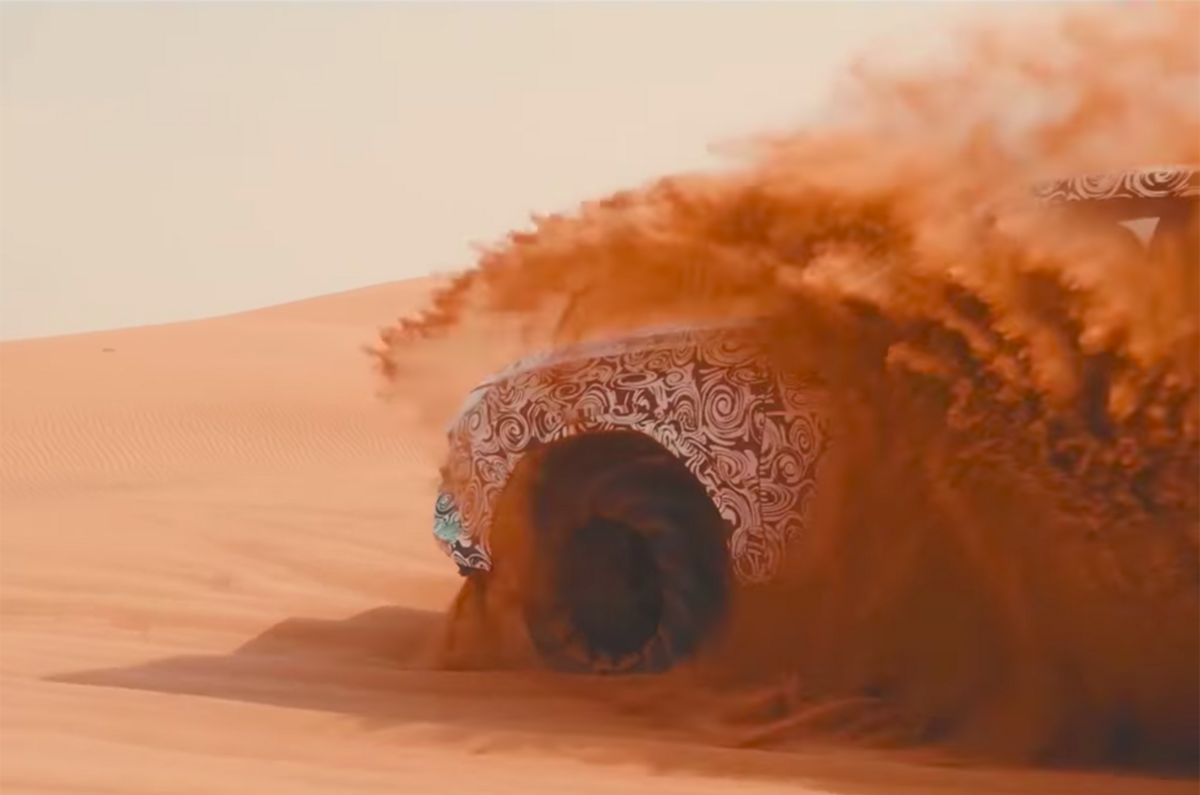 Lamborghini Urus on sand
