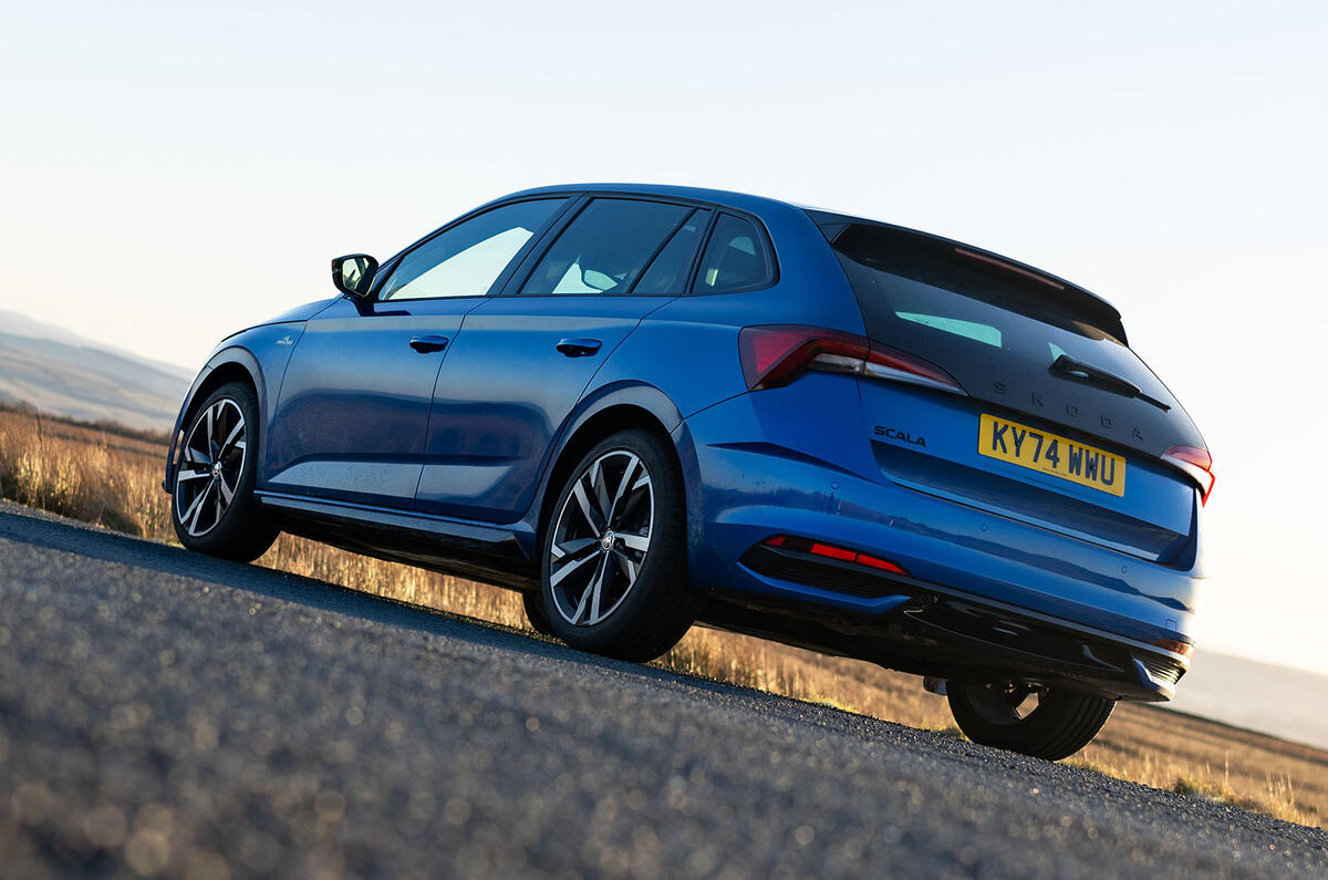 Blue Skoda Scala rear 3/4 static shot