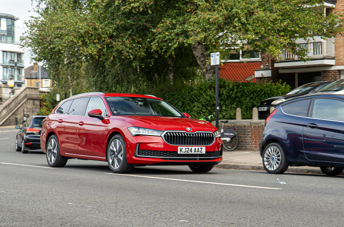 Skoda Superb front three quarters driving Skoda Superb front three quarters driving