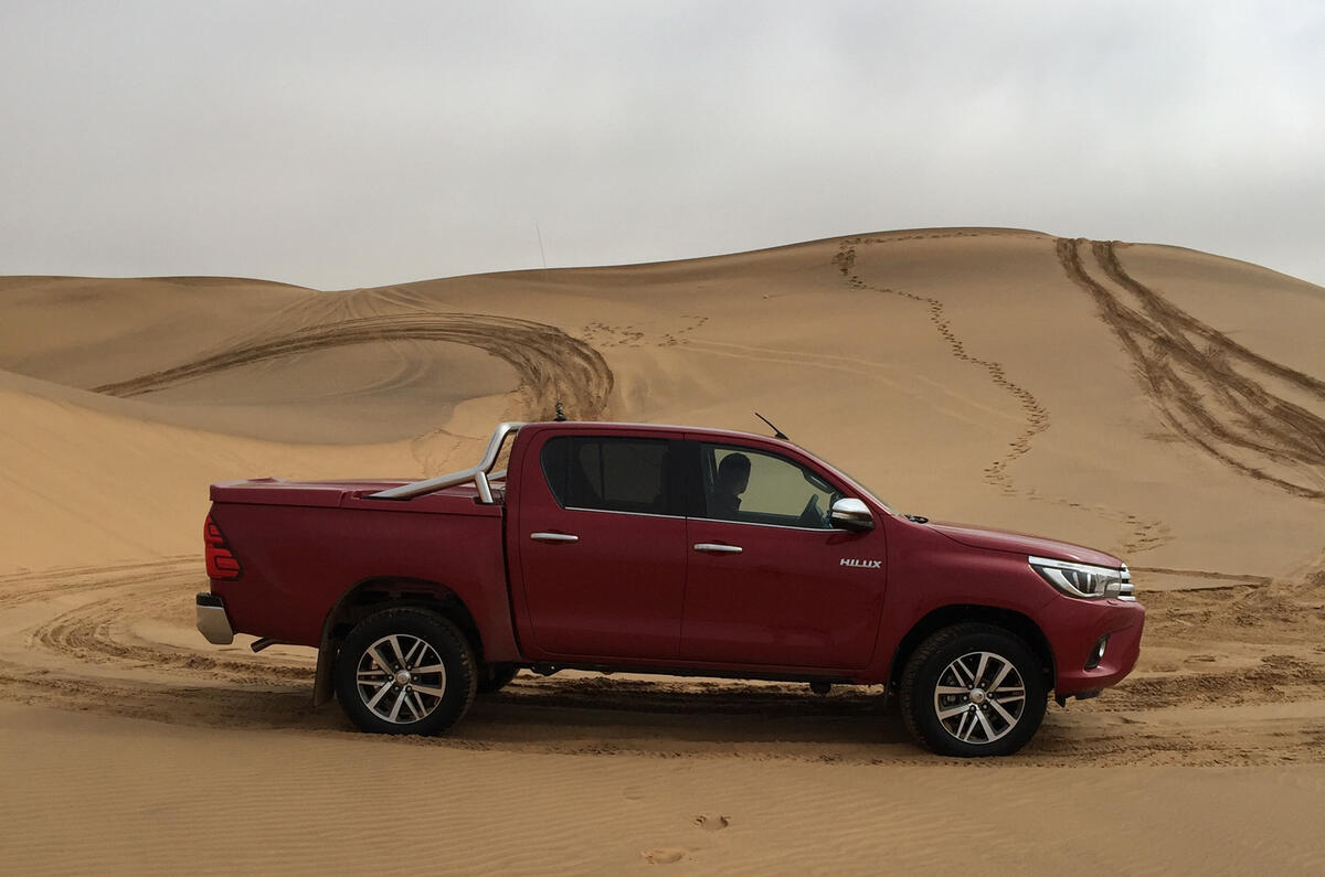 Toyota Hilux on sand dunes