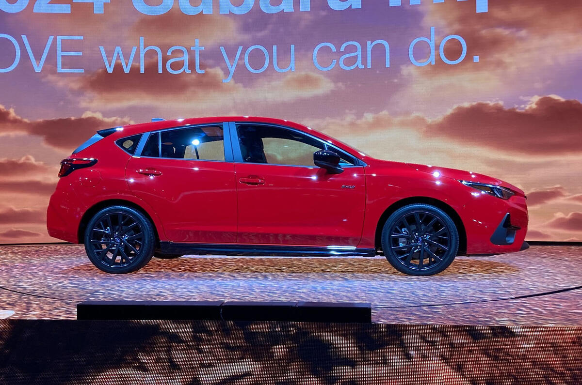 Subaru Impreza on display in los angeles red side