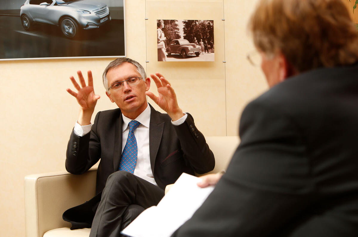 PSA chairman Carlos Tavares talks to Autocar