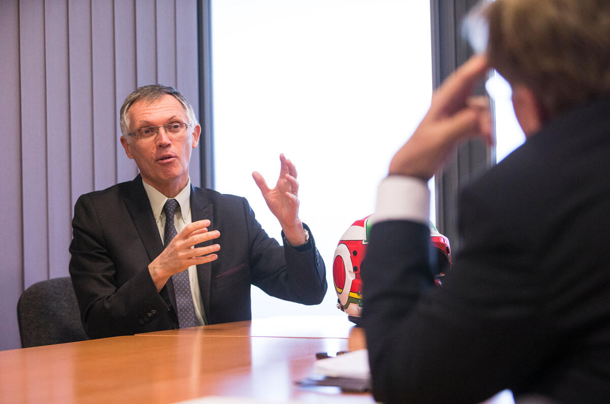 PSA chairman Carlos Tavares talks to Autocar