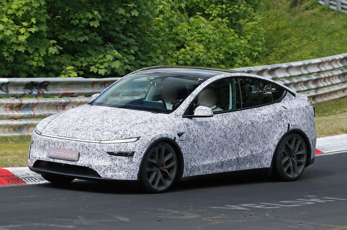Tesla Model Y Performance update camo front quarter tracking Tesla Model Y Performance update camo front quarter tracking