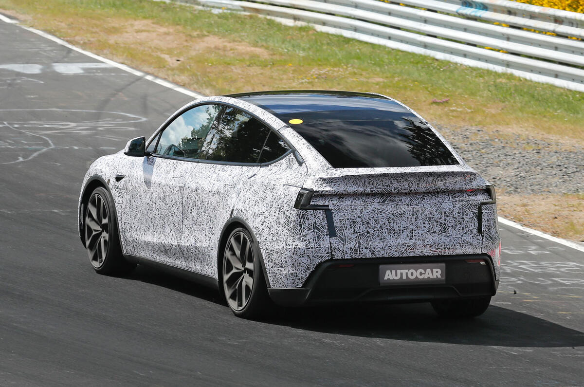 Tesla Model Y Performance update camo rear quarter tracking Tesla Model Y Performance update camo rear quarter tracking