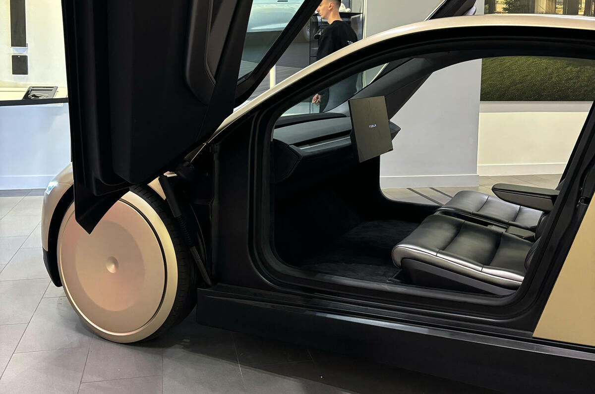 Tesla Cybercab doors open Tesla Cybercab doors open
