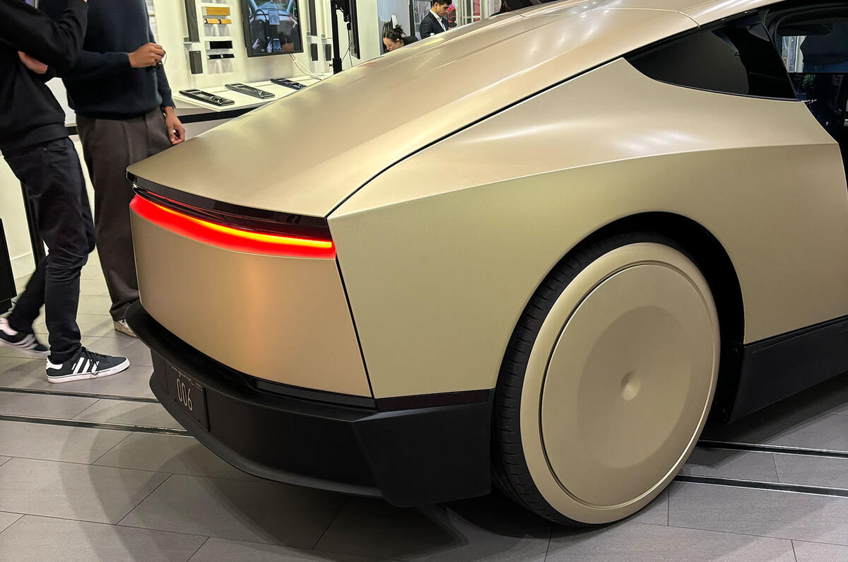 Tesla Cybercab rear three quarter Tesla Cybercab rear three quarter