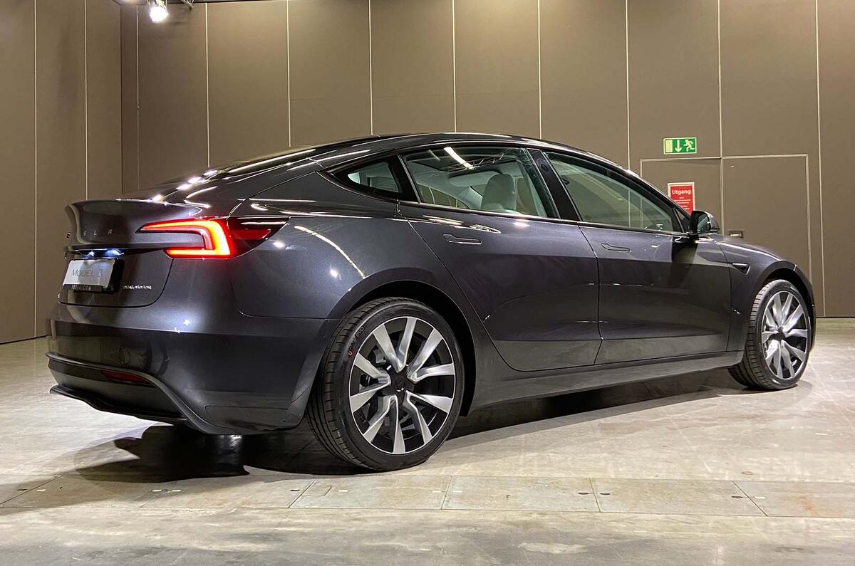 Tesla Model 3 rear three quarter Tesla Model 3 rear three quarter