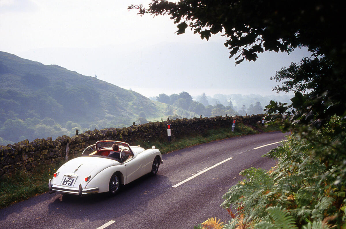 The sleek tail of the Jaguar XK series provided luggage space 
