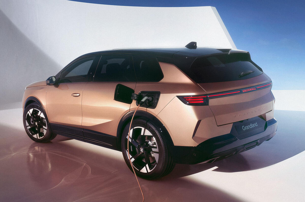 Vauxhall Grandland rear three quarter charging Vauxhall Grandland rear three quarter charging