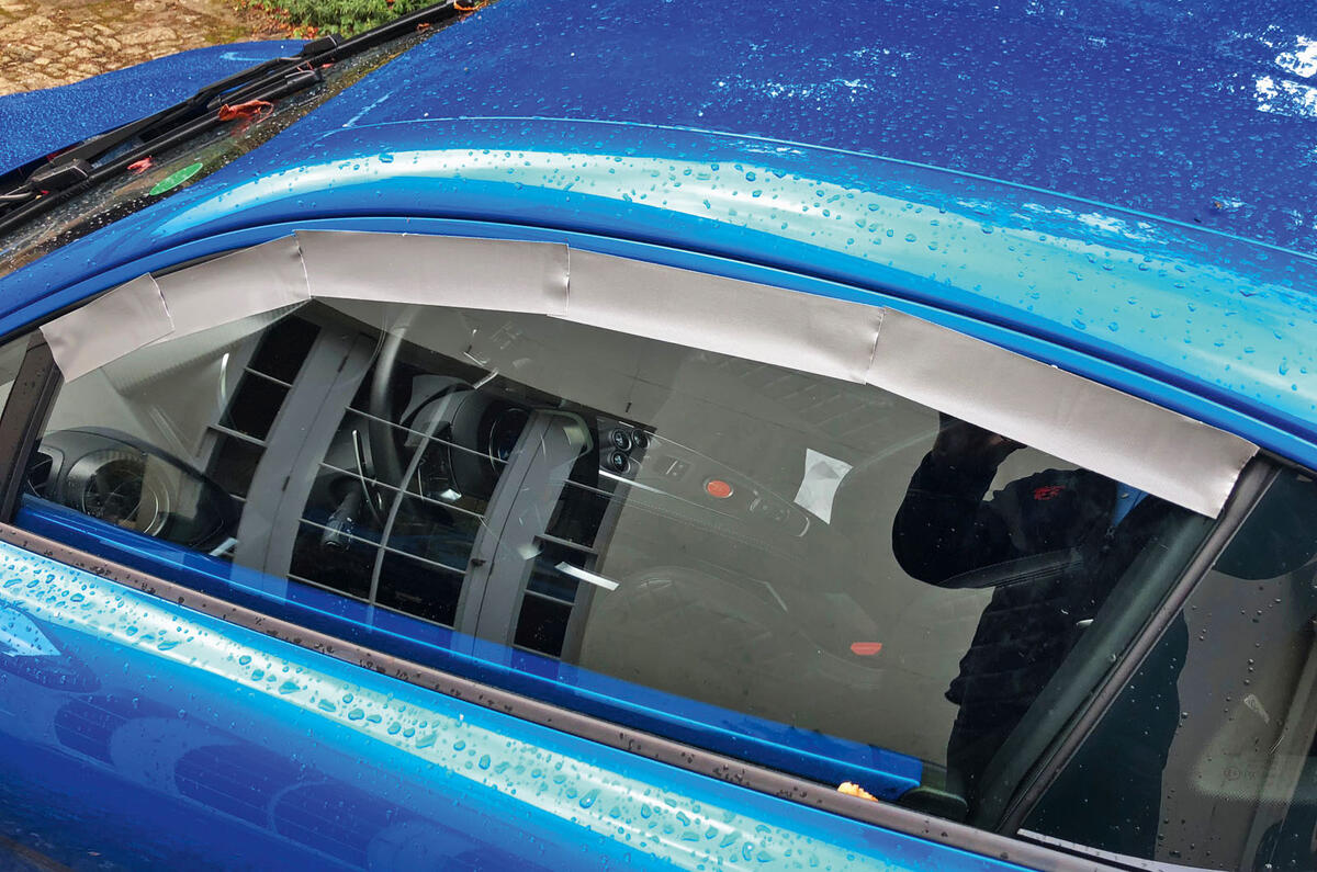 Alpine A110 open window with tape