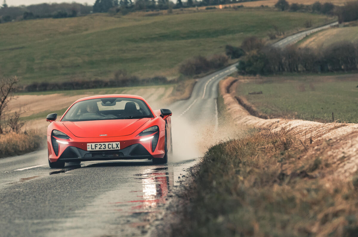 McLaren Artura through puddles