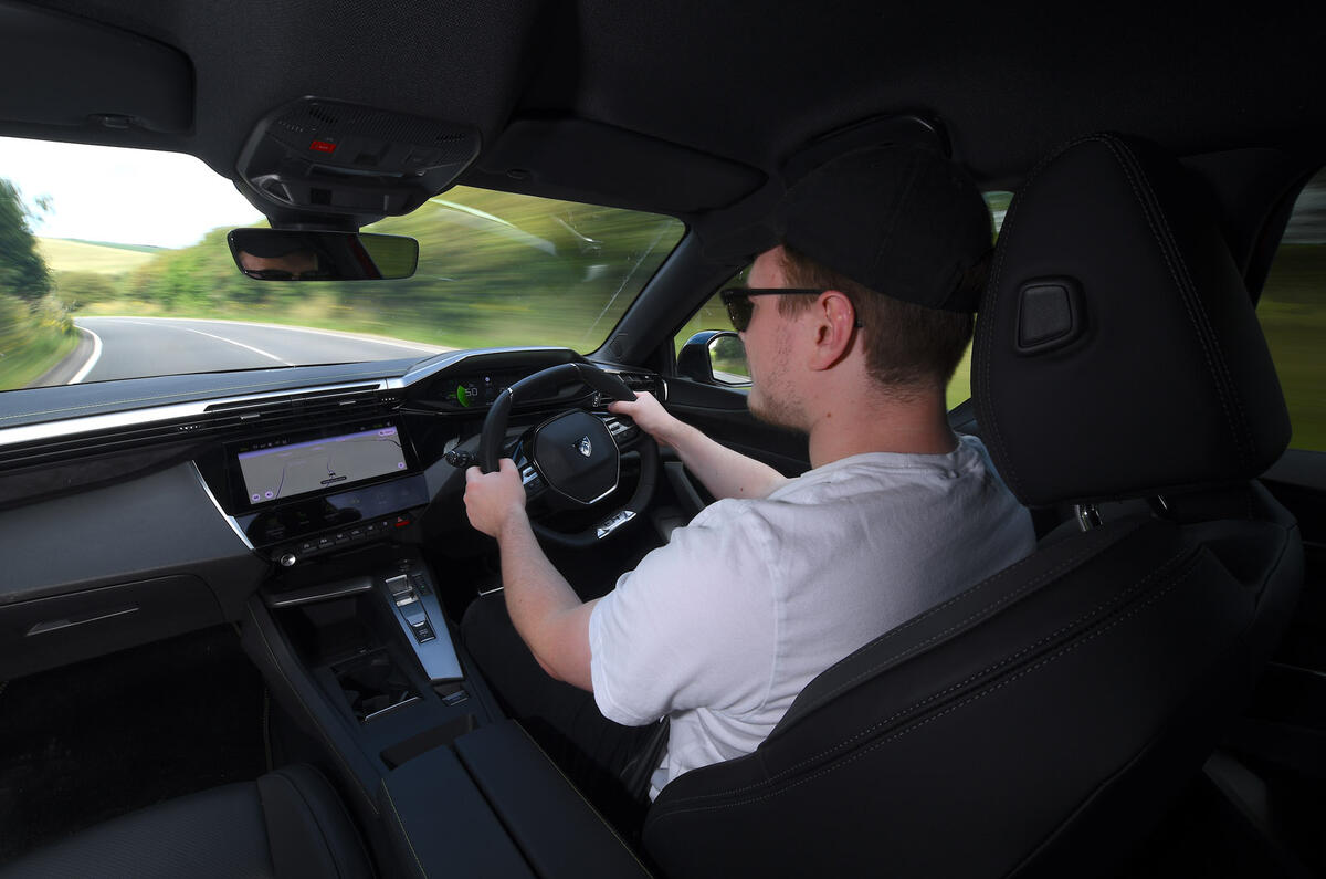 Peugeot 408 interior cabin over the shoulder Peugeot 408 interior cabin over the shoulder