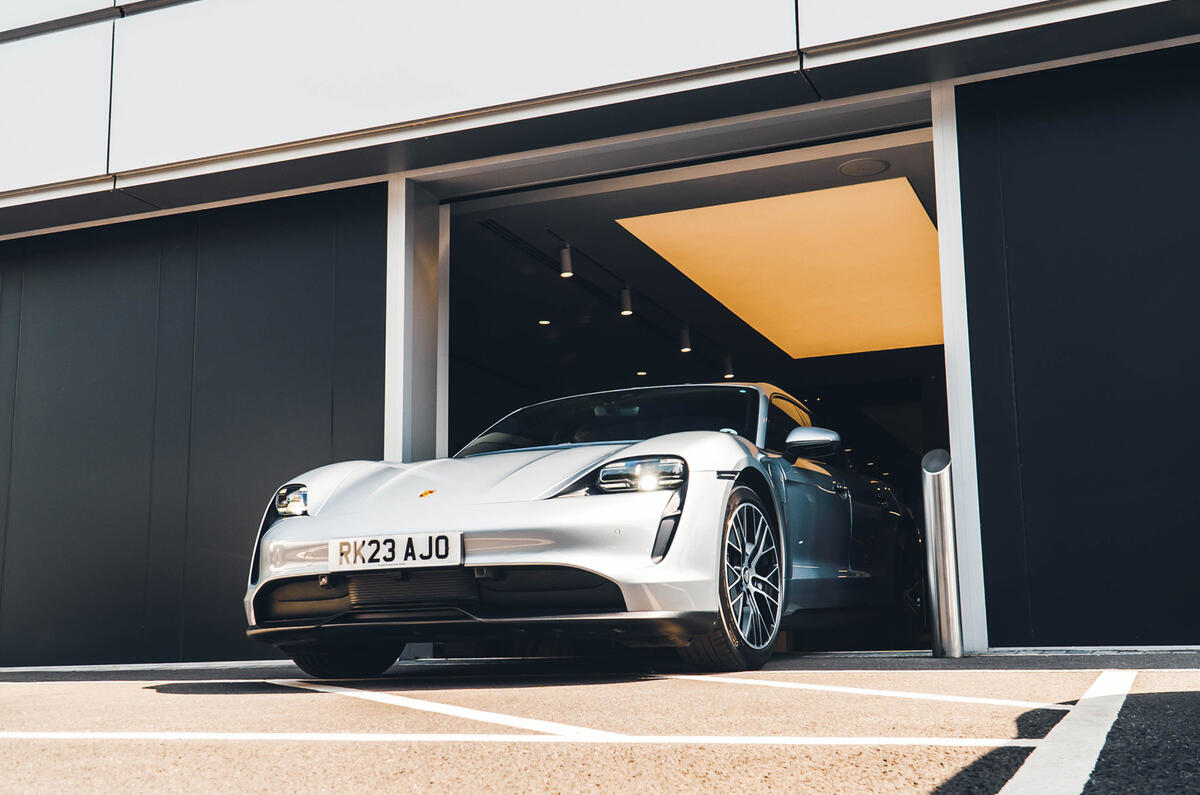 Porsche Taycan leaving dealer