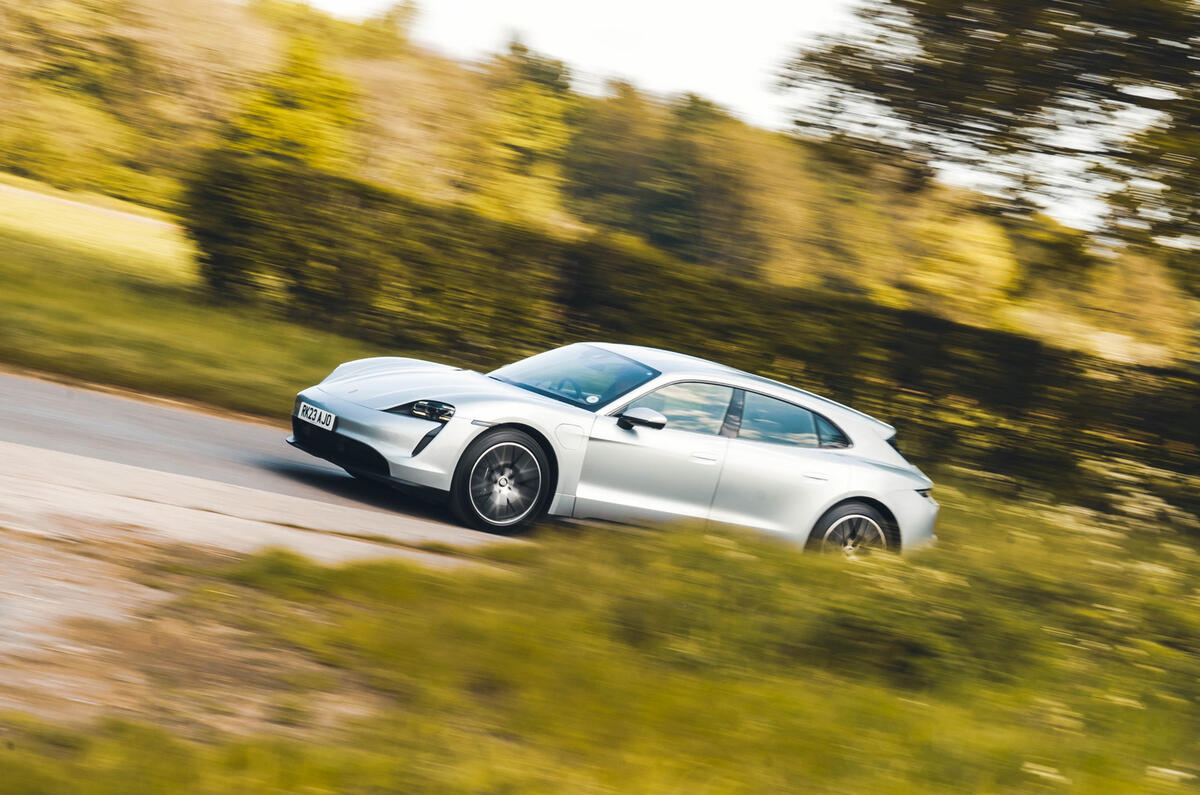 Porsche Taycan side driving 
