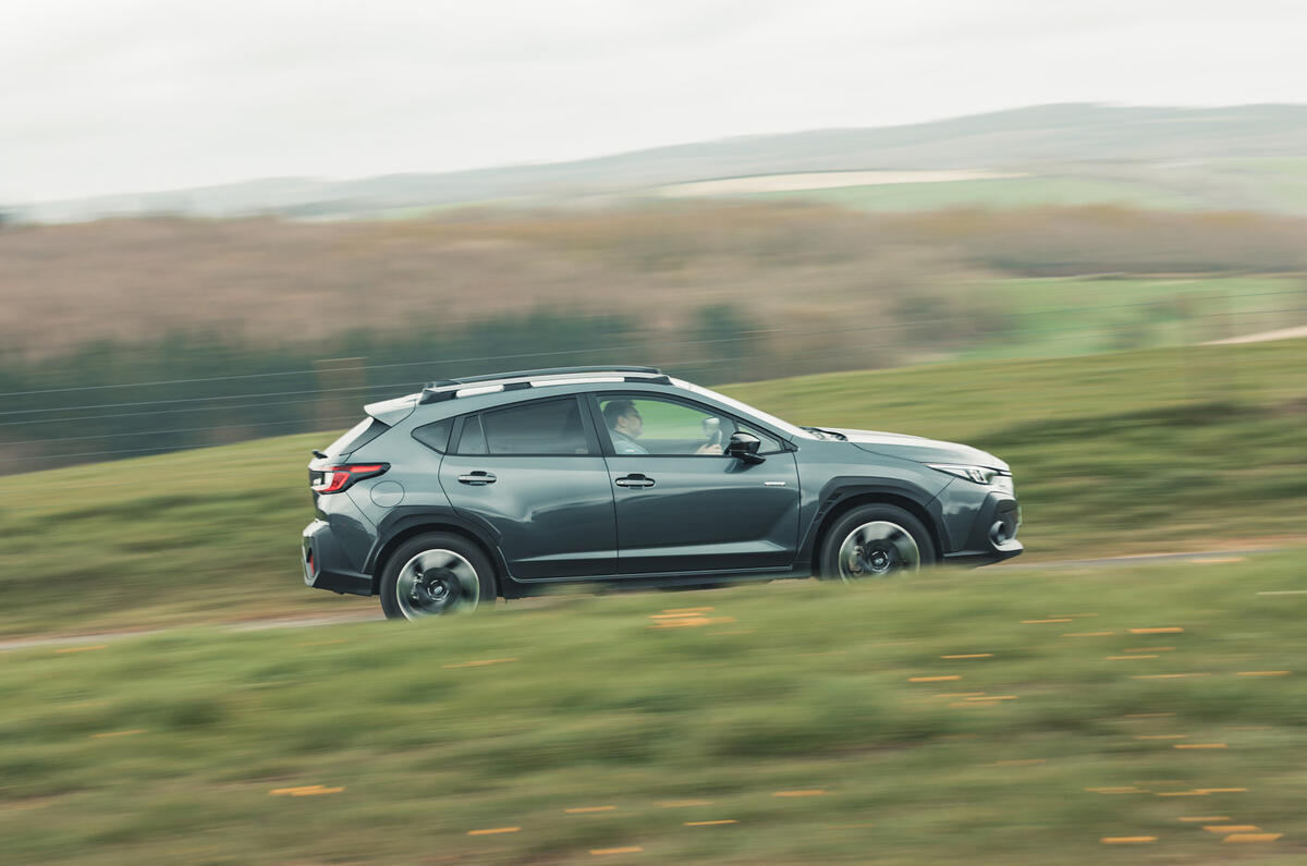 Subaru Crosstrek side driving shot Subaru Crosstrek side driving shot