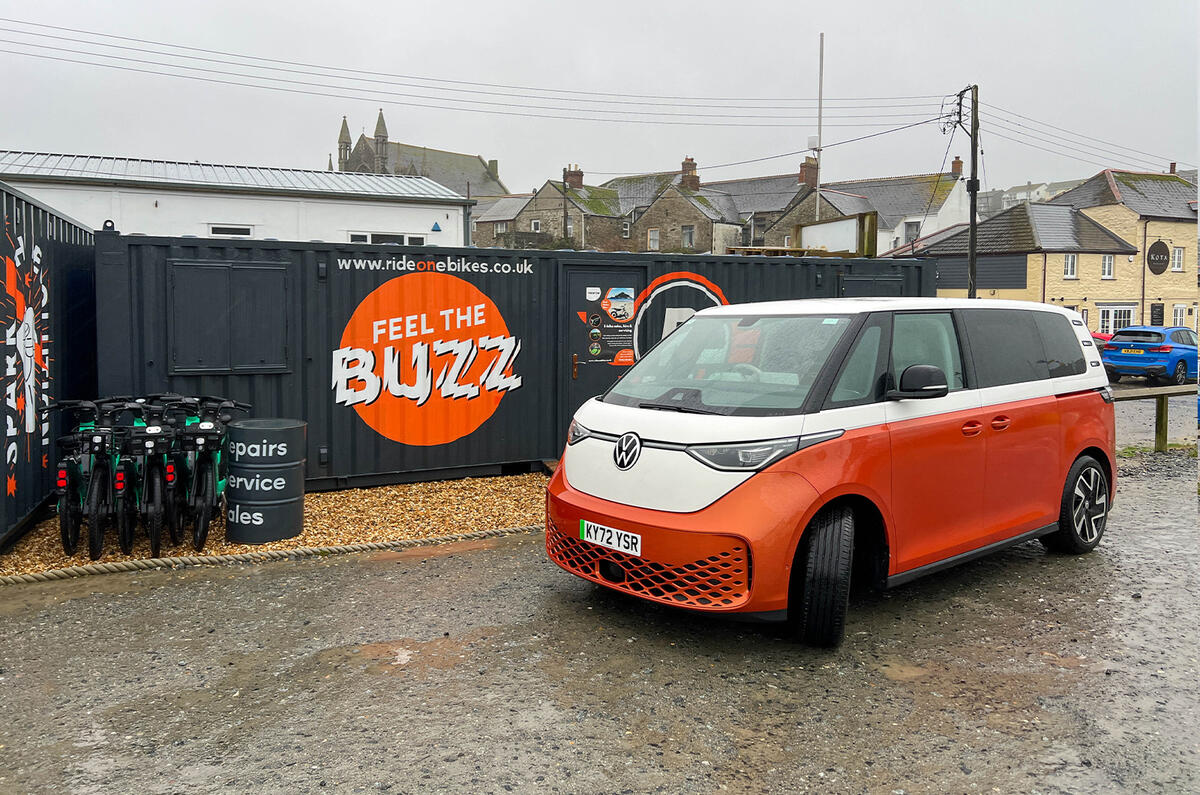 VW ID Buzz and electric bike logo