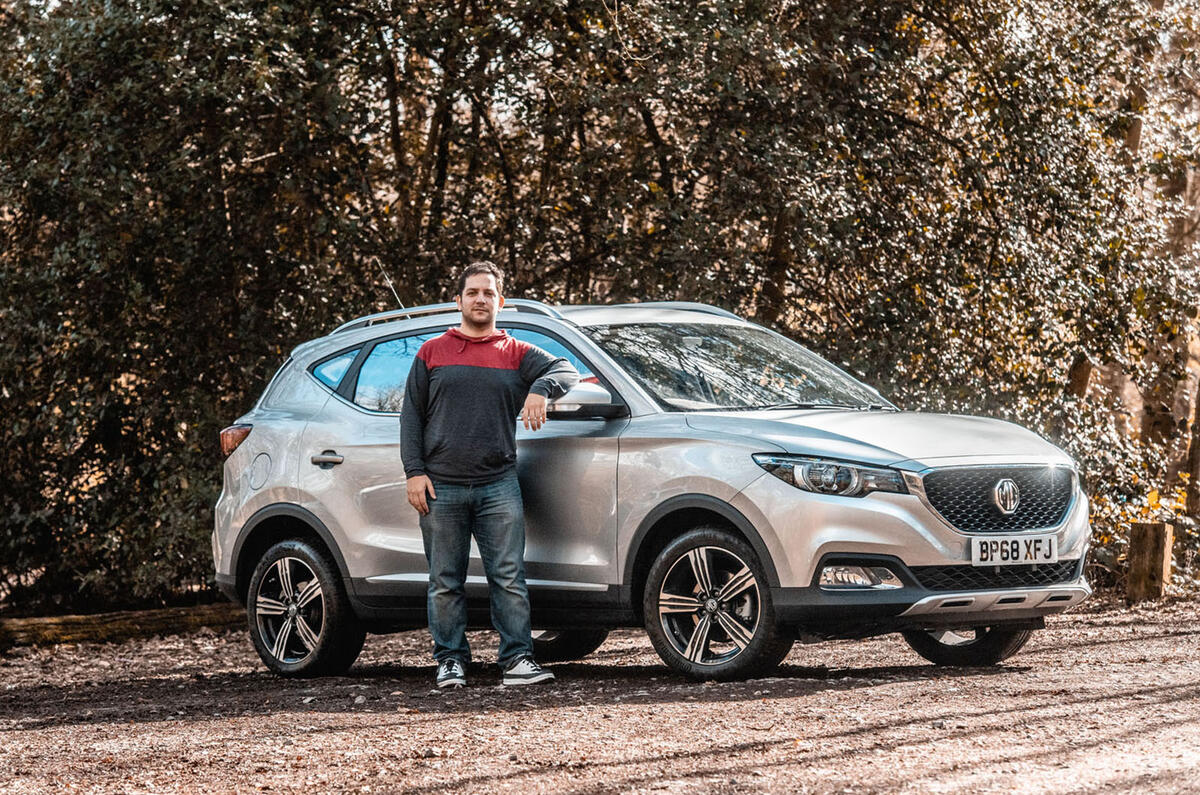 MG ZS 2019 long-term review - Olgun posing with car