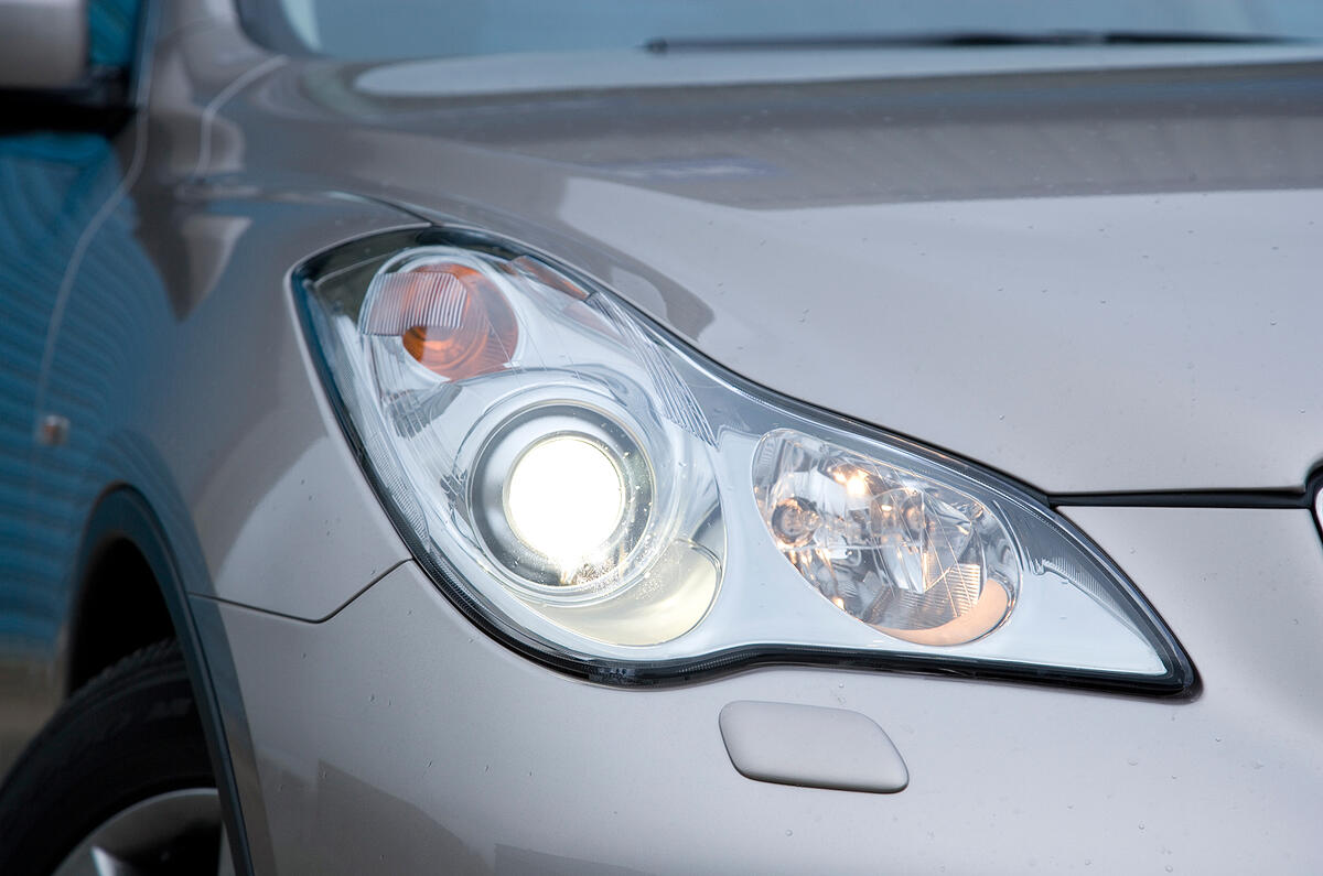 Slim and shapely headlights give EX a distinctive glare Infiniti EX xenon headlights