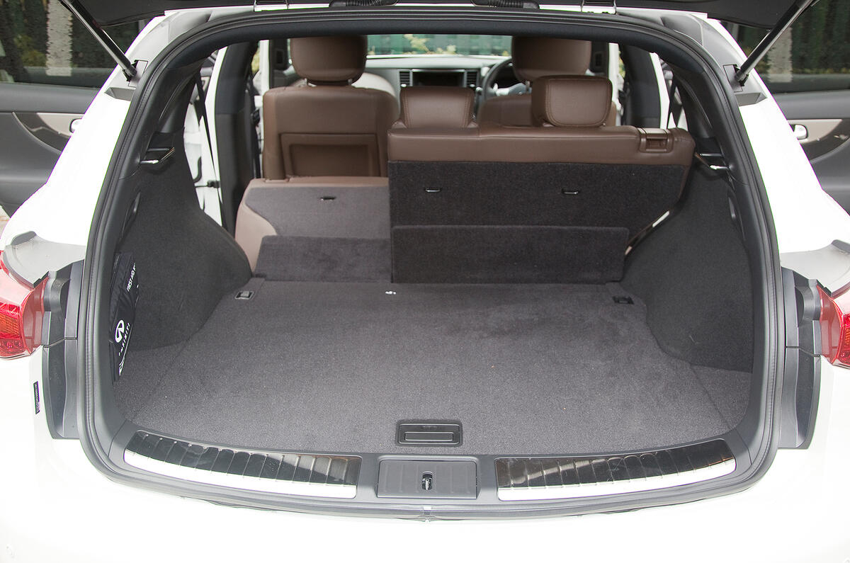 Boot capacity is hardly class leading, but at least the bench splits and will fold flat Infiniti FX boot space