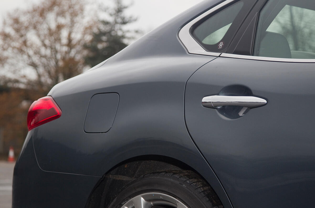 The flowing, rising hip line has translated well from the Essence concept to the saloon Infiniti M rear door