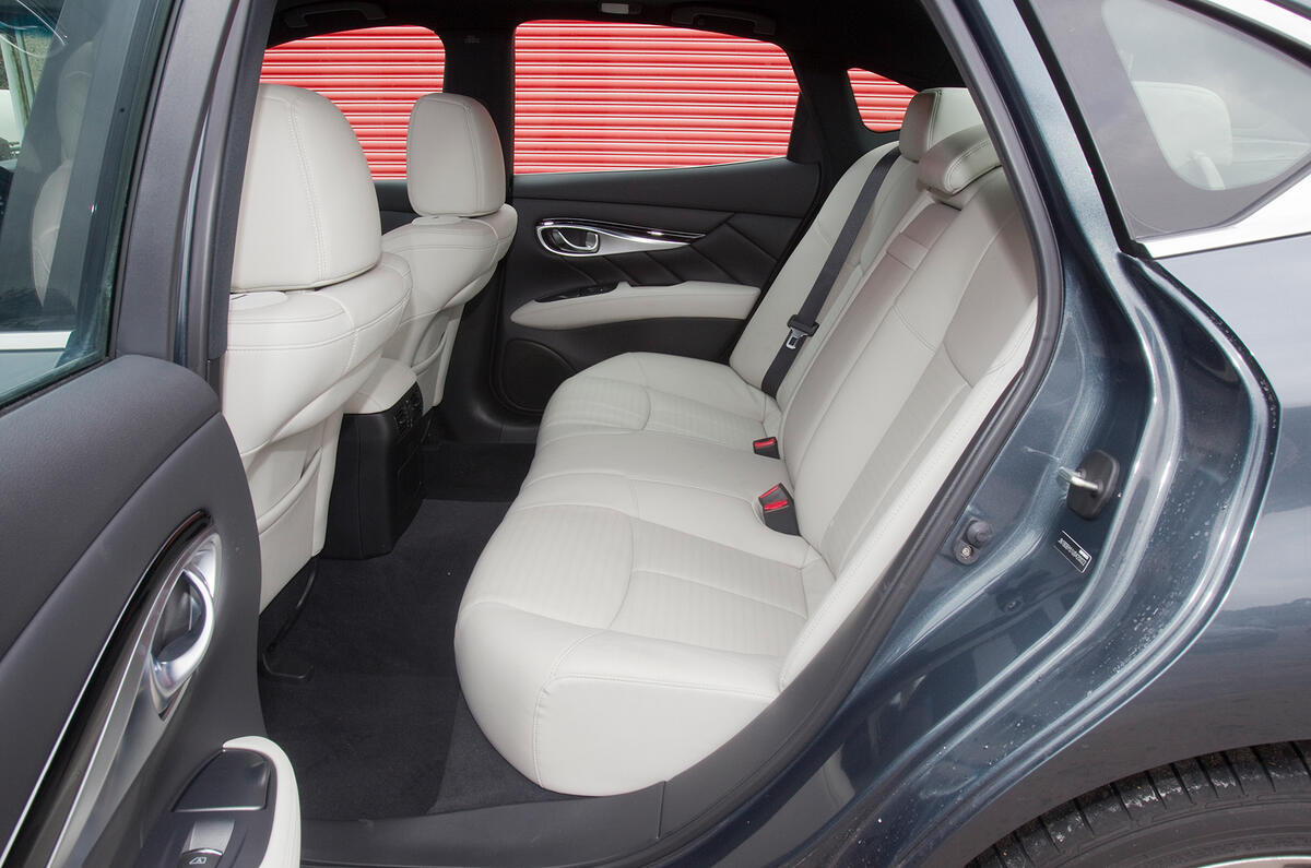 Rear accommodation is acceptable for two adults, but headroom is restricted Infiniti M rear seats