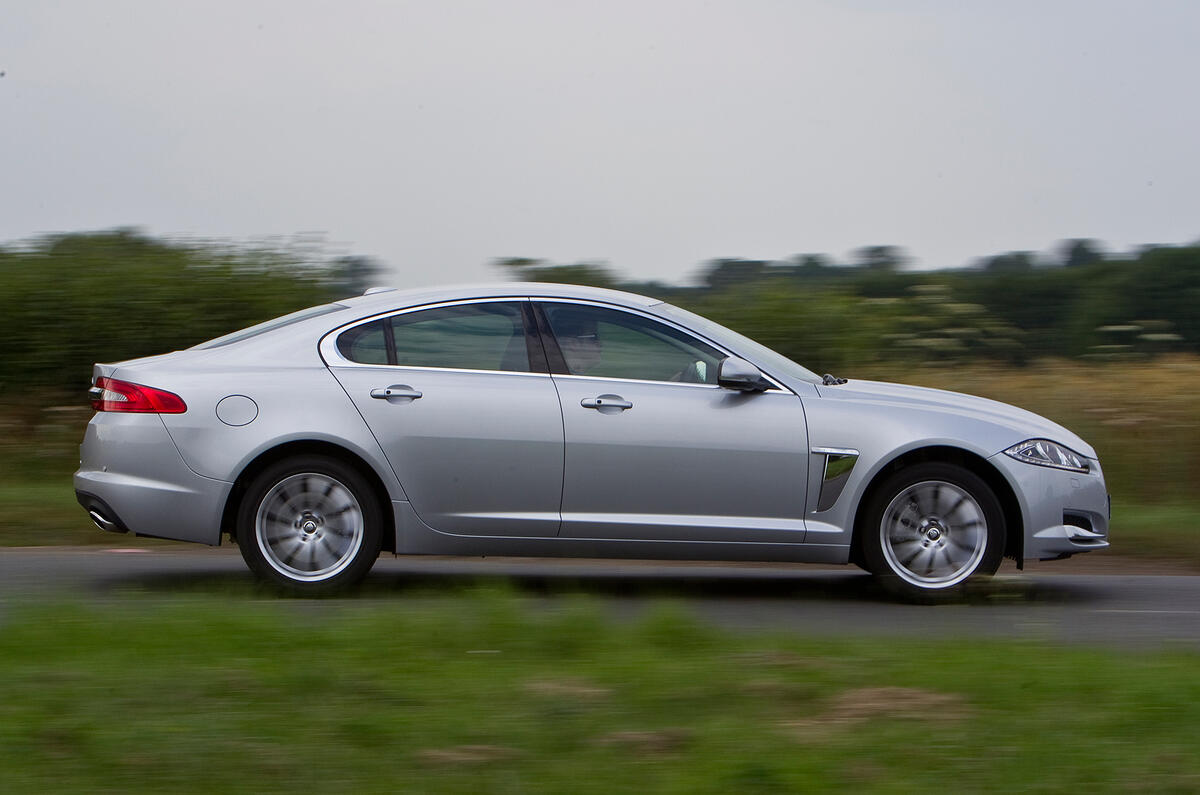 If you're after low emissions, pick of the range is the 2.2d Jaguar XF side profile