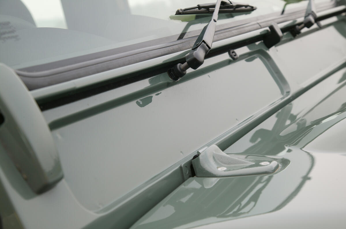 Tiny, flimsy windscreen wipers are pretty awful by modern standards The Defender's filmsy windscreen wipers