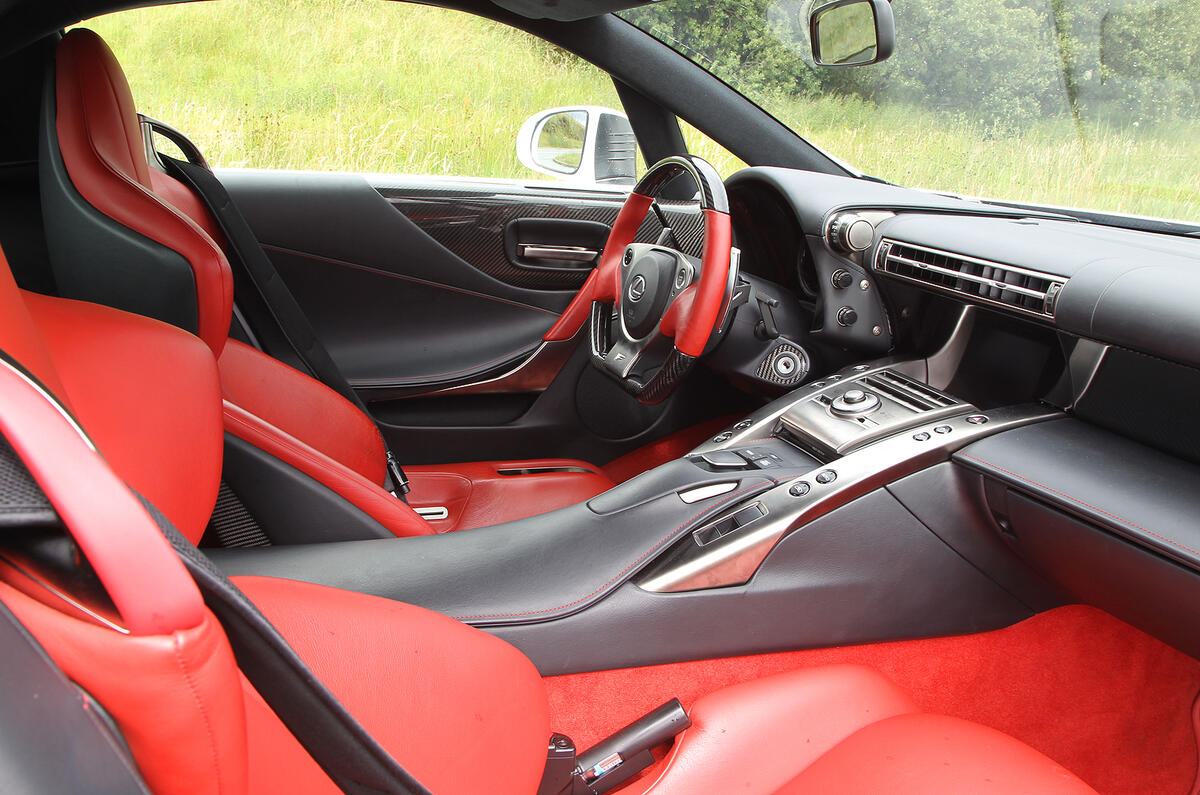 High-set window line and imposing cabin architecture create a cocooned feel Lexus LFA interior