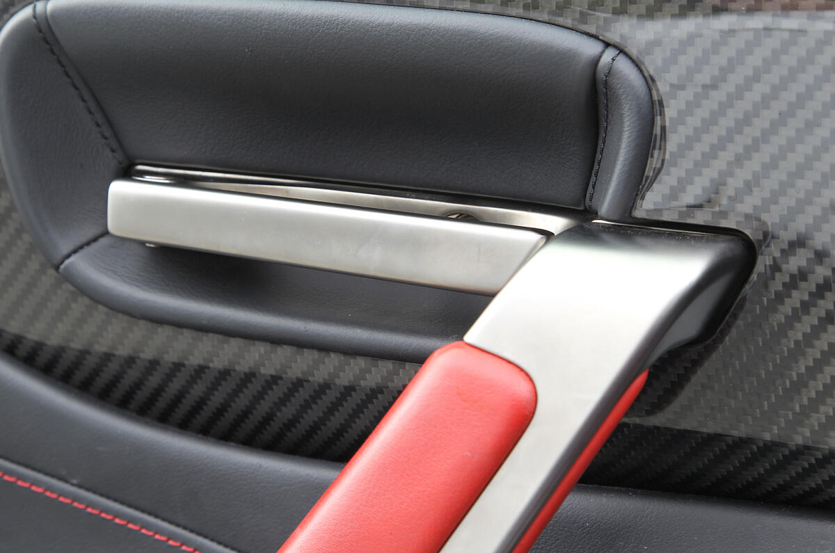 Everything you touch is made of premium materials Lexus LFA doorhandle