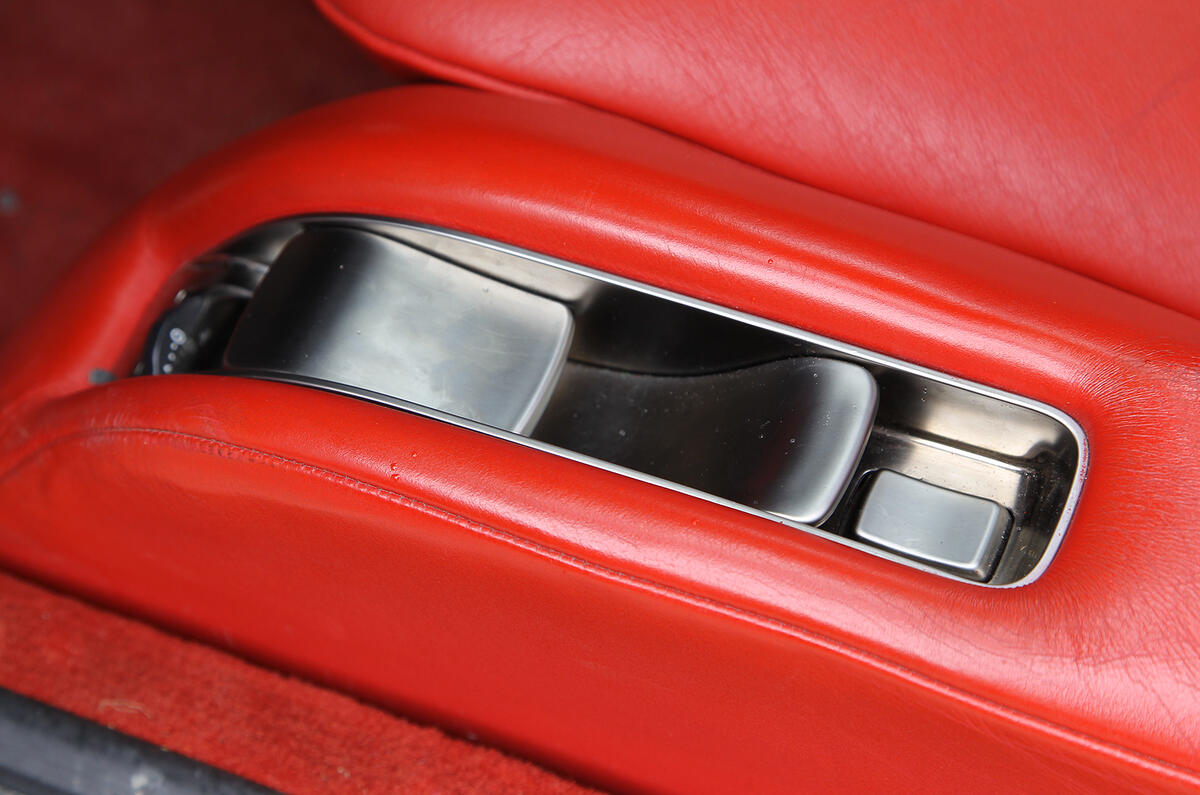 Seat adjusters are more like metal sculpture than switches Lexus LFA seat adjustment controls