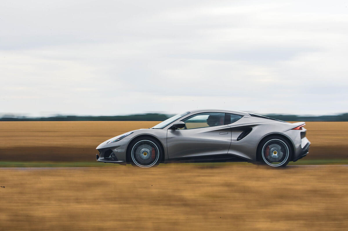 lotus emira 4 cylinder 2023 review 02 panning side lotus emira 4 cylinder 2023 review 02 panning side