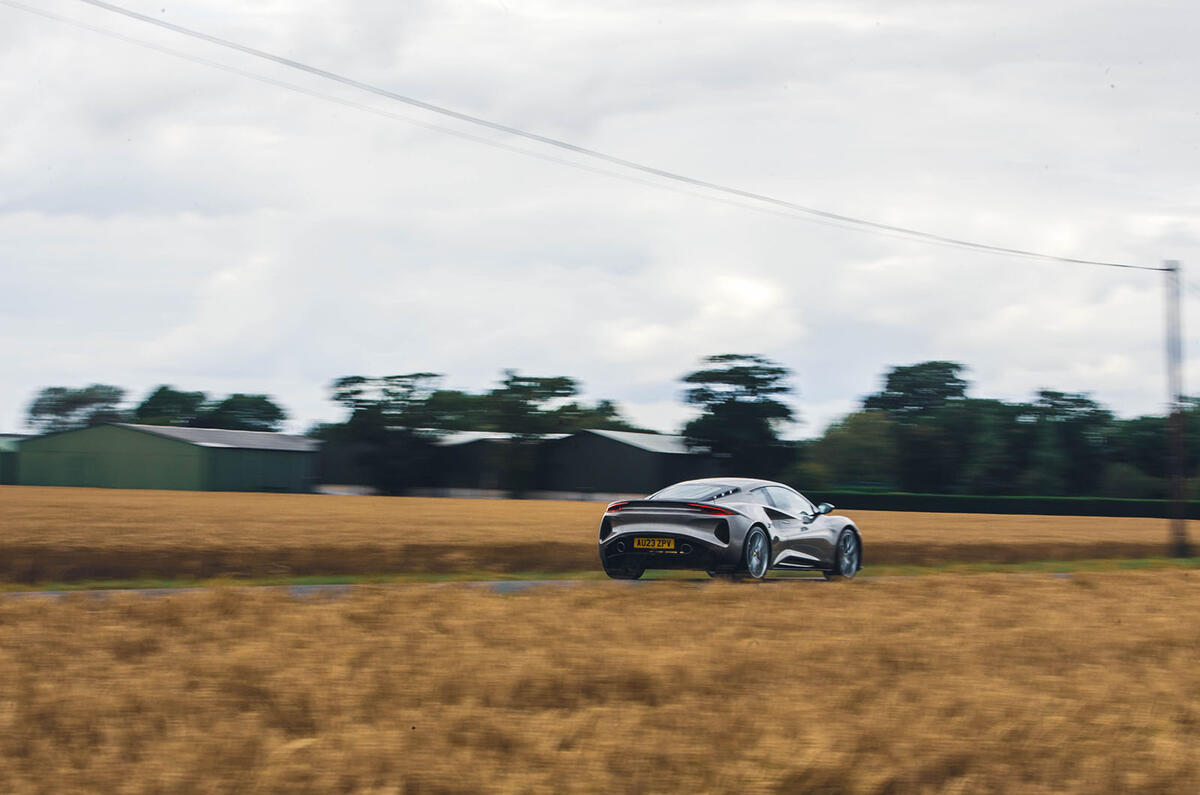 lotus emira 4 cylinder 2023 review 07 panning rear lotus emira 4 cylinder 2023 review 07 panning rear