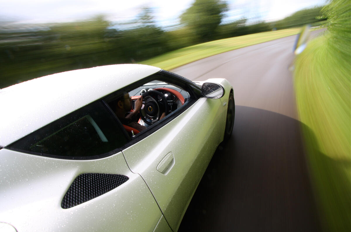 Crossover feature between the side glass and rear screen is a visual trick to hide the cabin height Lotus Evora rear
