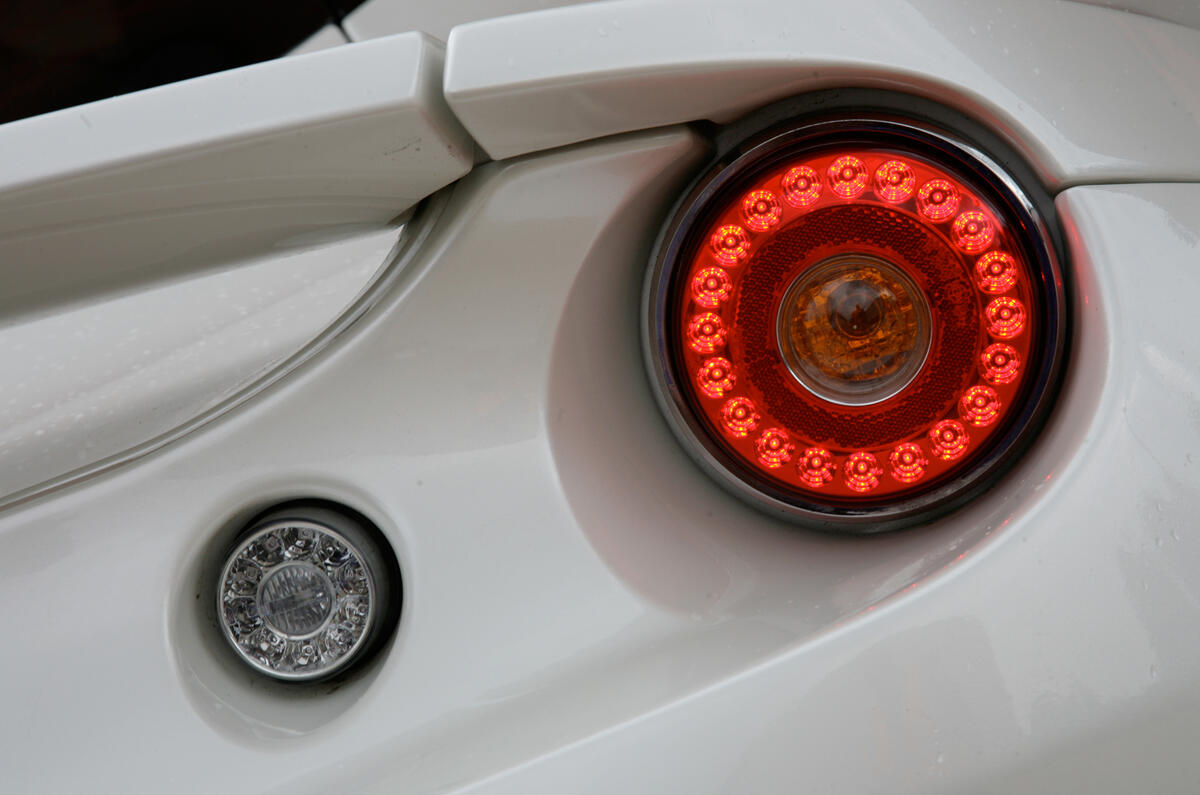 Smaller secondary rear lights are the reversing and fog lights Lotus Evora rear lights
