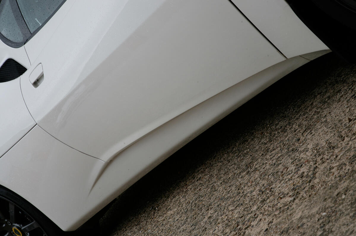Sills are designed to visually push the rear wheels to the extremities of the body to accentuate agility and athleticism Lotus Evora side skirts