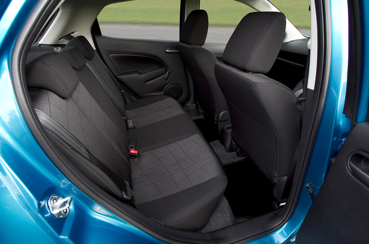 Rear legroom is reasonable, but you're forced to sit more upright than normal Mazda 2